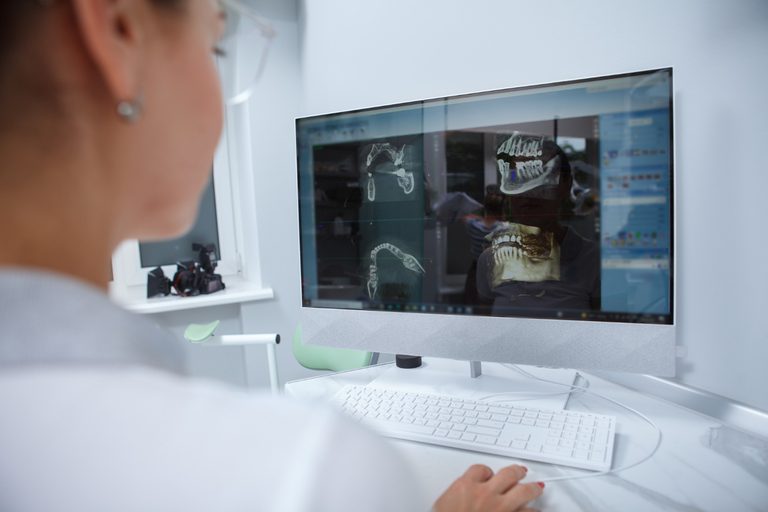 Dental Implant Safety in Pompano Beach: What a 3D Scan Sees That an X-Ray Cannot