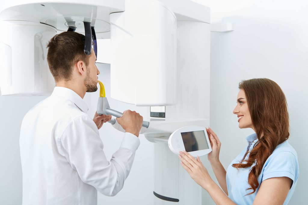 Patient having a CBCT 3D scan used to plan oral surgery at South Florida Smile Spa in Pompano Beach